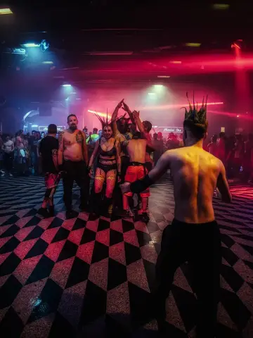 Photos from the Number One floor, crowd in pink smoke